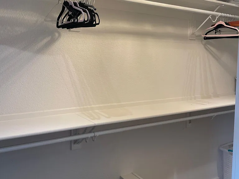 Huge master closet with enclosed shoe closet