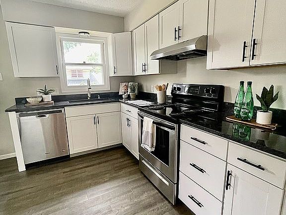 kitchen, stainless & quartz