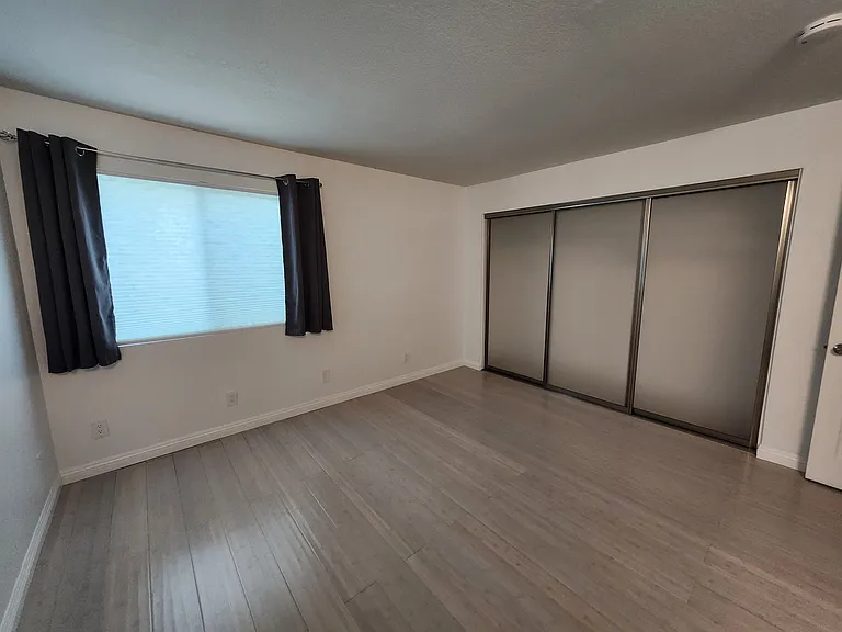 The room now has a ceiling fan with a light and remote.