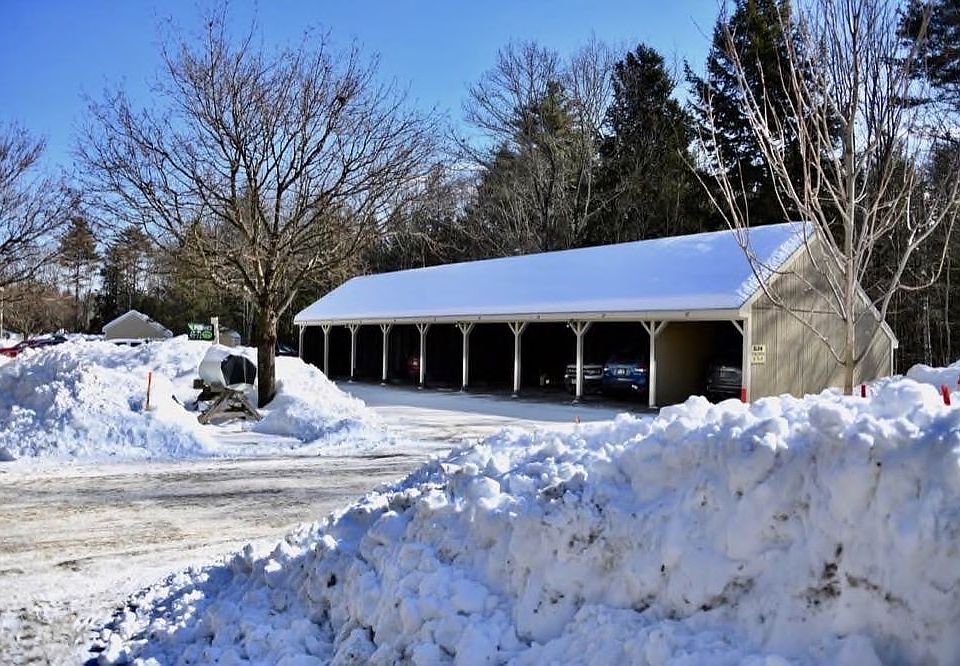 Carport is directly across from your sliding glass doors.
