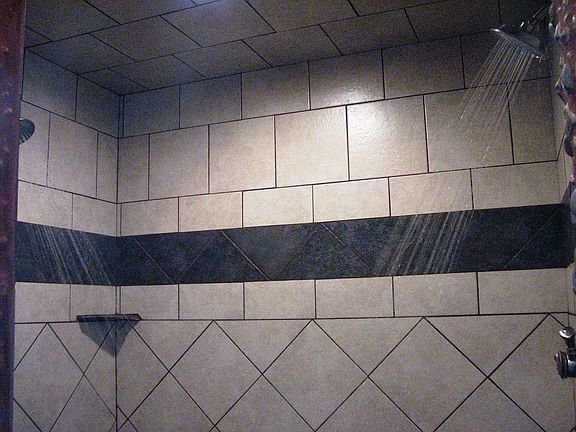 Dual shower heads in custom master bath shower