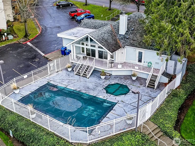 The complex has amenities such as a clubhouse, pool area, and workout room. 2 parking spots included. One covered.