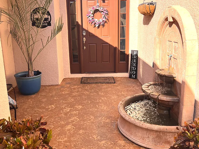 Front entrance with water fountain