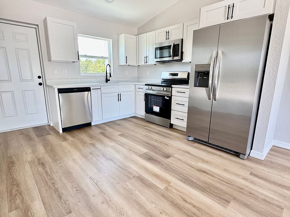 Open concept looking into Kitchen from Living room