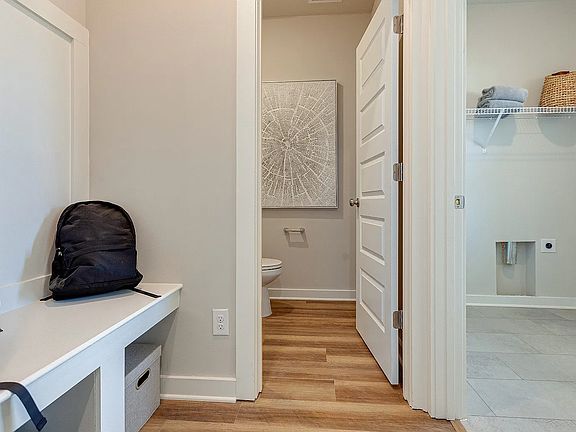Floor plan pictures from builder - Entry way, laundry room and half bath