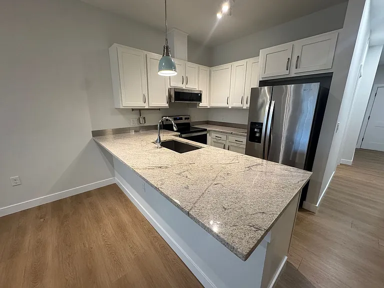 MAIN STREET TIMES LLC - 319 MAIN STREET APARTMENTS — Photo 10