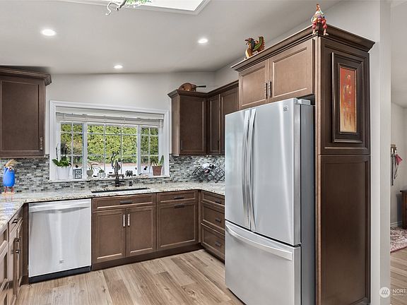 Kitchen SS refrigerator transfers with the home>