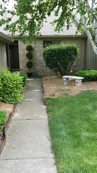 Front Entrance : Front door entrance with plants and bench