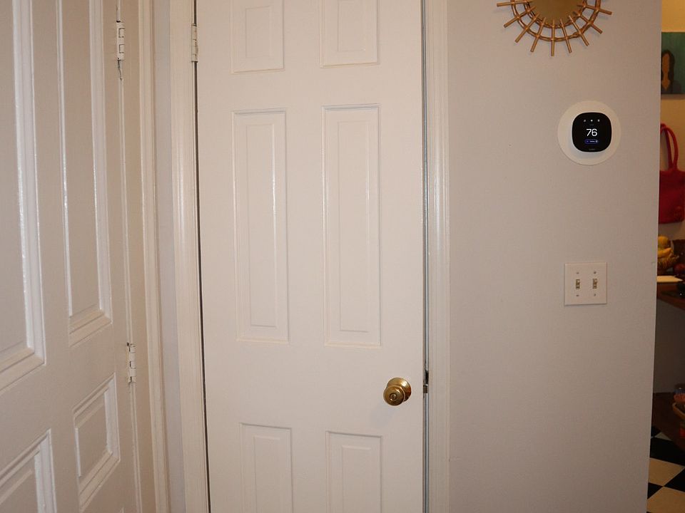 Coat closet to the left of the entrance.