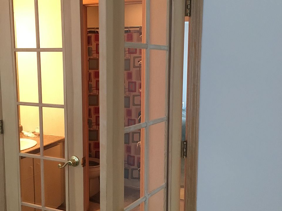 French doors with walk-in closet