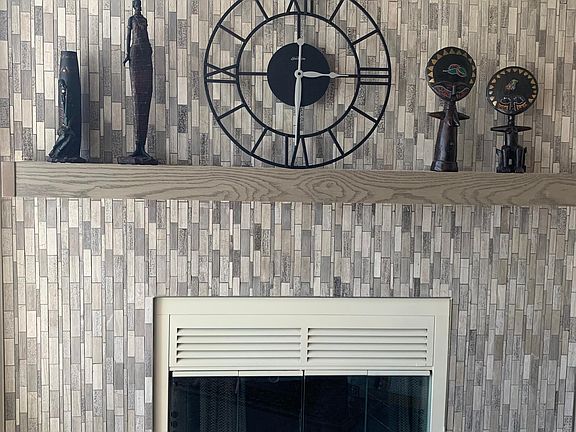 Floor to ceiling mosaic fireplace
