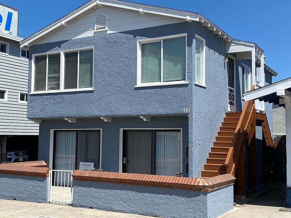 Lower unit with double sliding doors and front patio