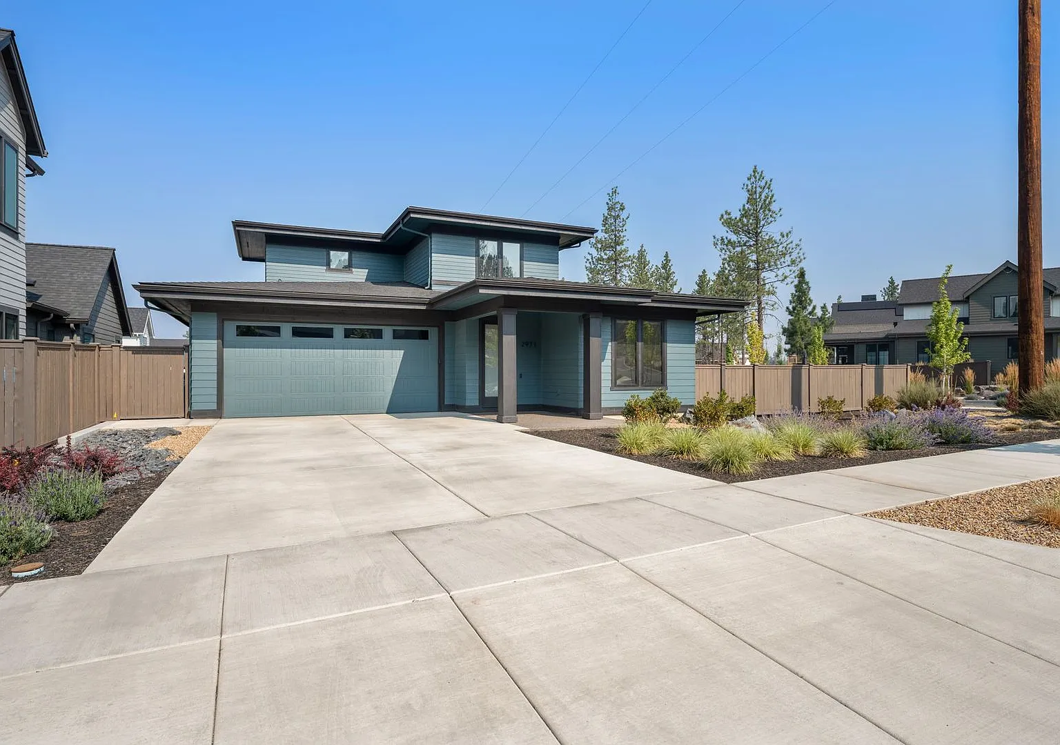 Modern NWX 4 Bed 3 Bath Home with Main-Level Primary Suite — Photo 1