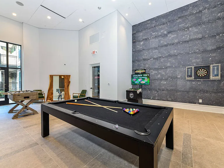 Challenge your friends to some leisurely competition with a game of billiards.