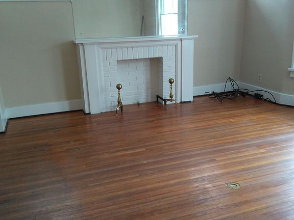 Fireplace with mirror to ceiling and nice windows for extra 
