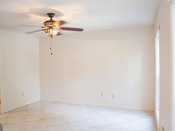 Formal dining room as you walk in the front door to the right