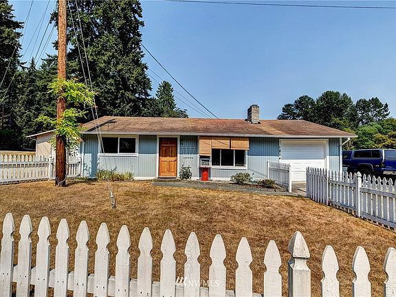 864 square foot home with garage and additional storage garage