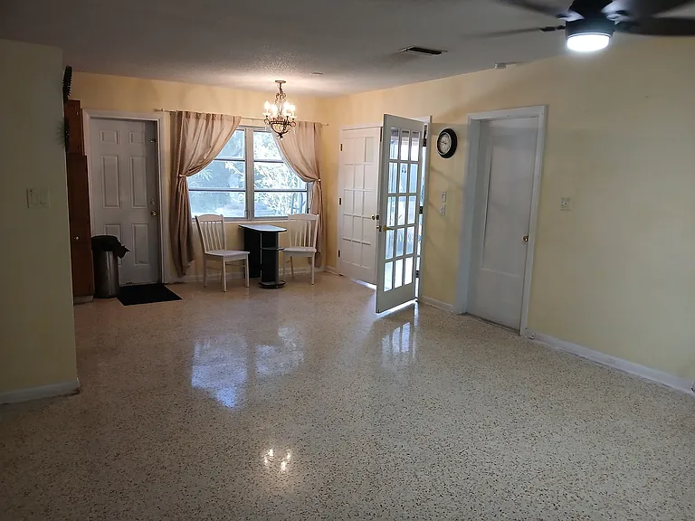 This is the kitchen window, looking out onto the beautiful Tropical back yard and pool area.