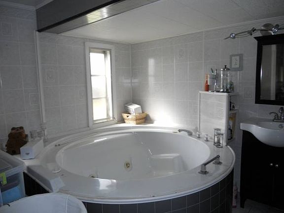 LARGE JETTED HOT TUB