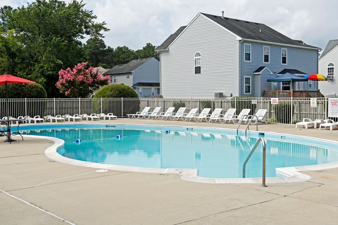 Relax waterside at our serene community oasis!