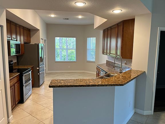 5th image of 3520 SW Sawgrass Villas Dr #4-C