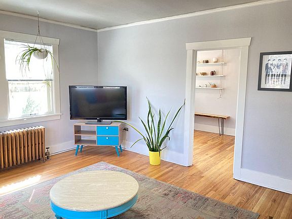 Looking into the dining area and kitchen.
