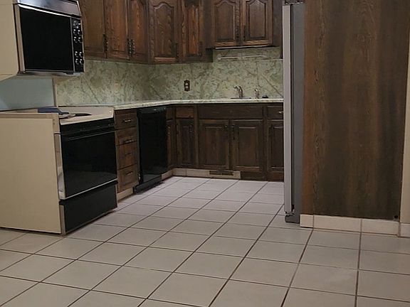 5th image of 9506 S Garnet Dr