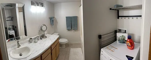 Upstairs bathroom and laundry.