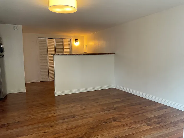 Bedroom section with wall to wall closet