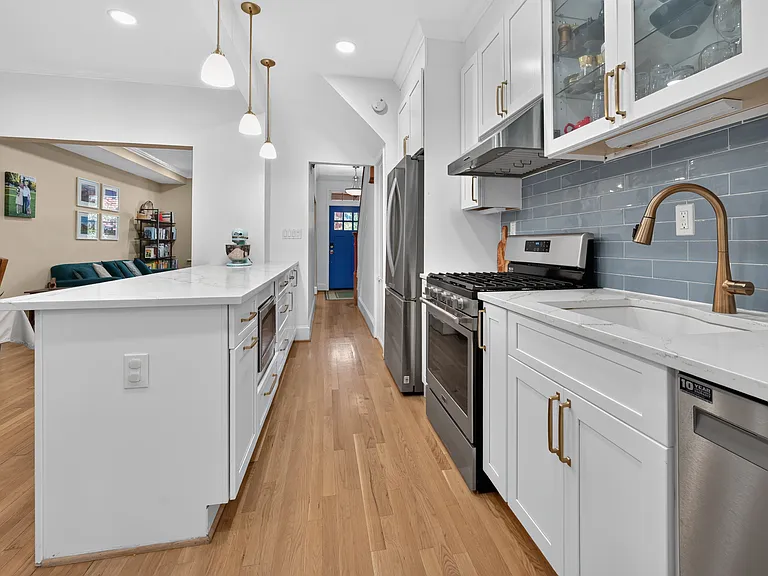 Kitchen, looking back towards the front door