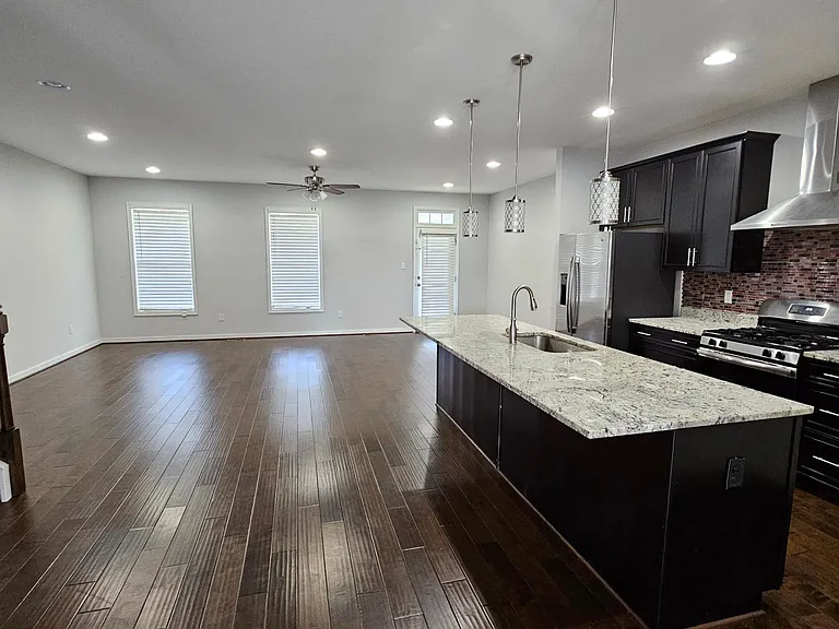 Kitchen, breakfast area & Living (22'x 12') and access to outside balcony (20'x4')