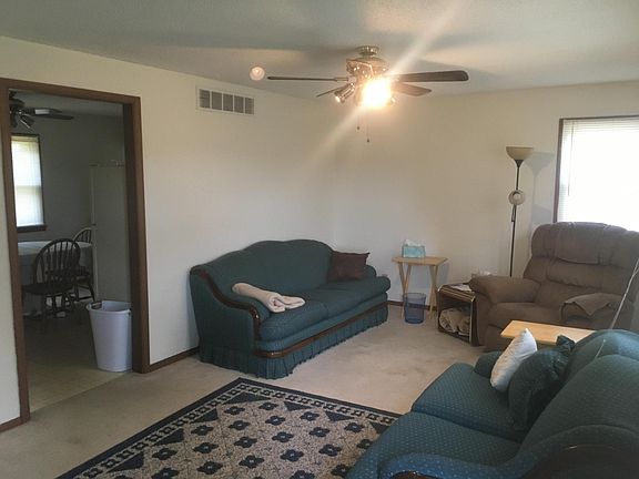 Living room looking into kitchen.