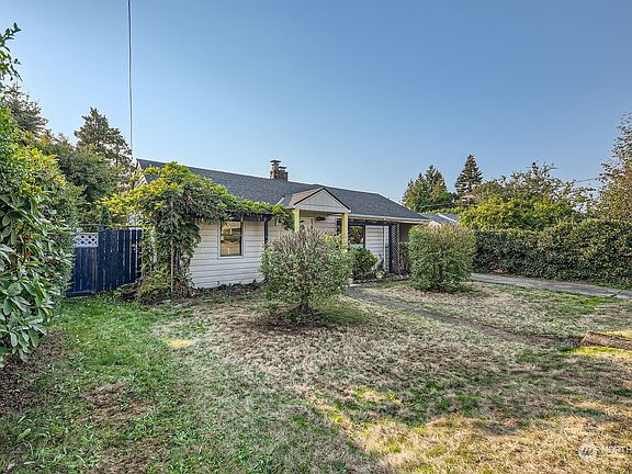 1,720 sq. ft. home with carport, nestled on a 7,011 sq. ft. lot.>