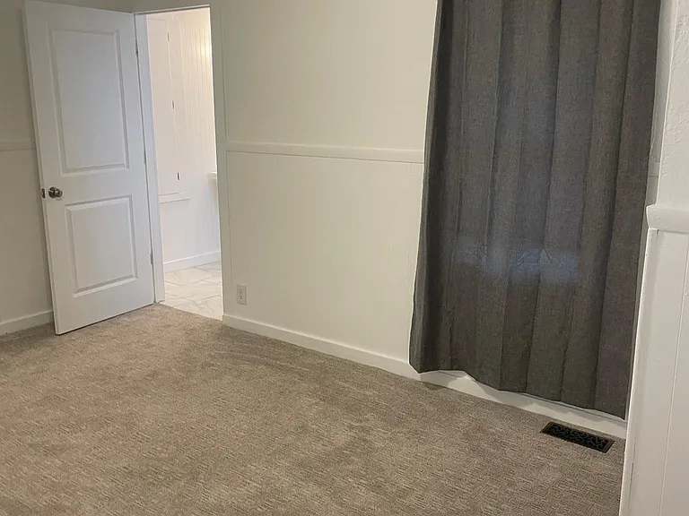 bedroom door to the bathroom
