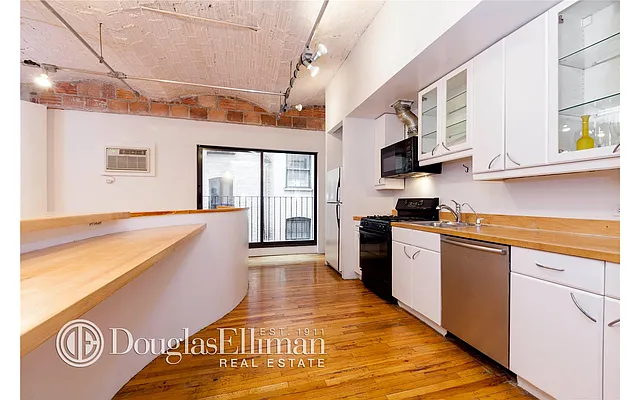 Sold by Douglas Elliman | media 13