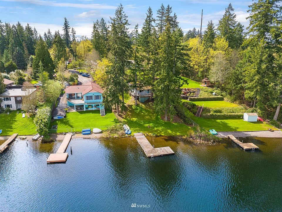 Own a slice of paradise on Shady Lake. Comes with dock and nice lawn area to enjoy! No motor boats on this lake.  Note - This property is to the right side of the bright blue colored house.>