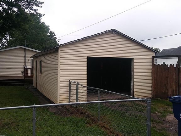 Large, older garage. 18 x 30 feet. Has a power opener.