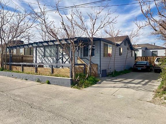 A quiet private bungalow with a sunny front deck and ample parking.