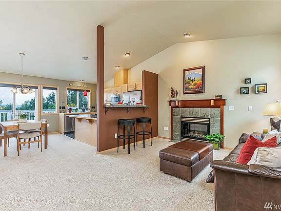 Light & Bright Open Floor Plan w/Vaulted Ceilings & Can Lighting.  Dramatic Views from all Main Living Spaces!