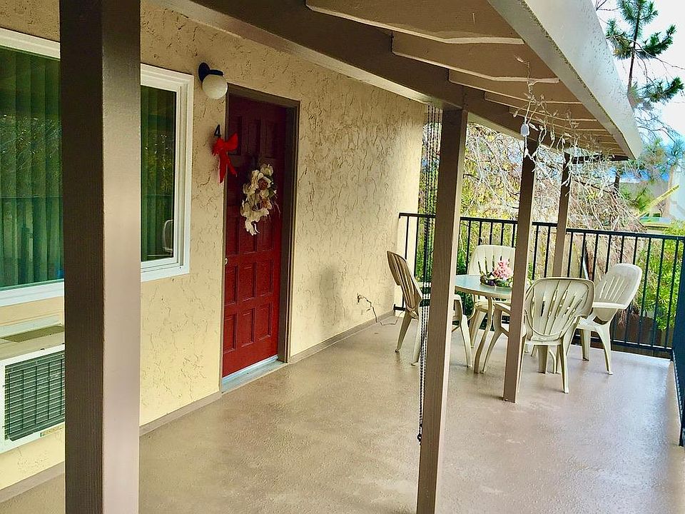Large patio facing south with pull-down sun shades