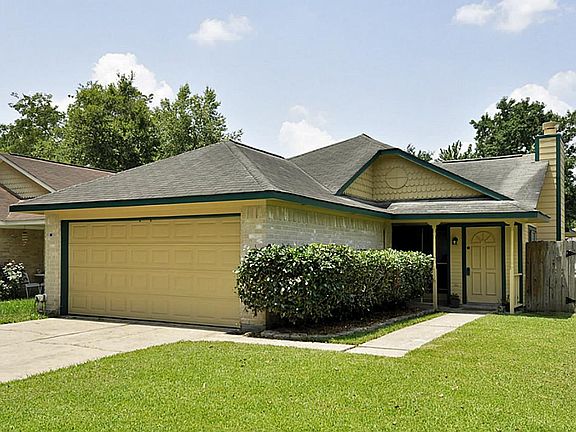 Great curb appeal on this charming property. Recent paint on exterior and lush green yard.