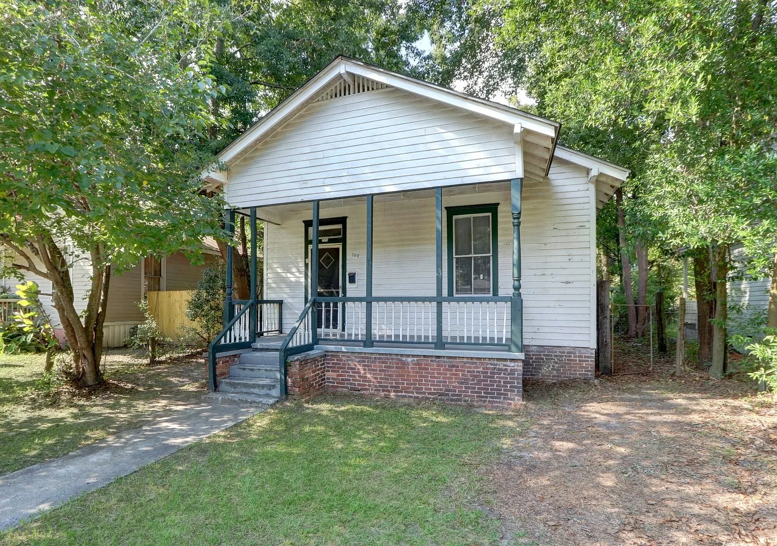 Single Family Home - Three Bedroom/Two Full Bathroom — Photo 1