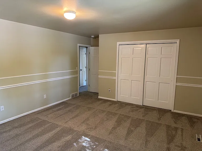Very spacious bedroom with large closet