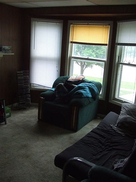 Second floor living room with a nice bay window.