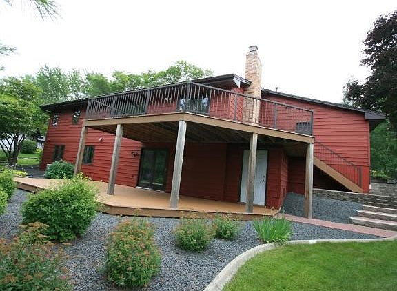 New low maintenance, wrap-around deck. Fabulous patio.