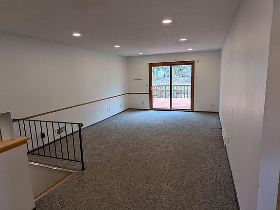 Living Room With Walkout Deck