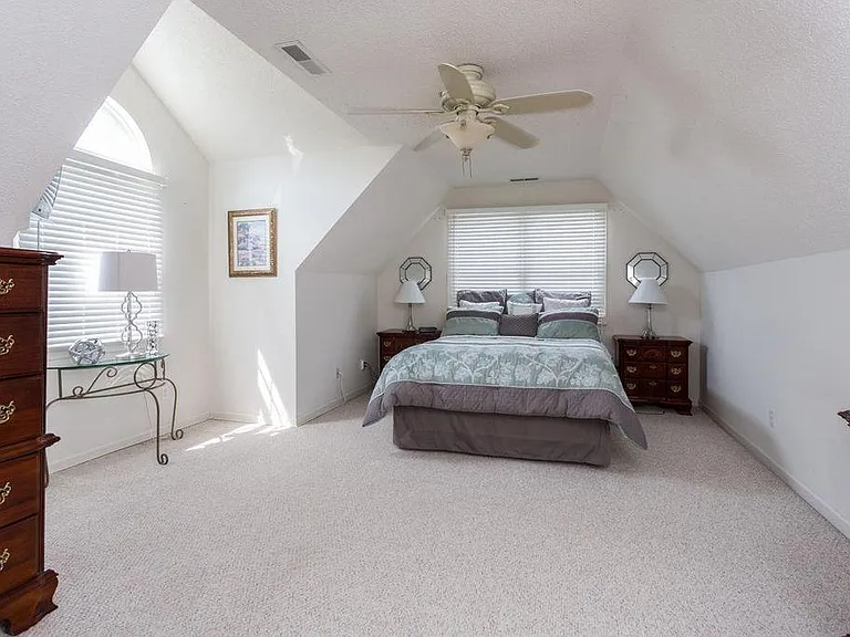 Upstairs master? playroom? home school space? guest bedroom or office. Your choice. with over garage attic storage access.