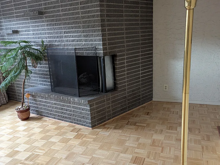 Downstairs living room 25 X 13. Very bright room with views of Pikes Peak.
