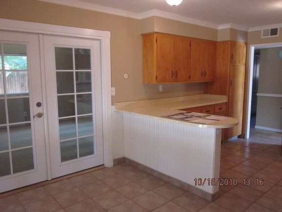 Dining Area and view of French Doors to Living Room
