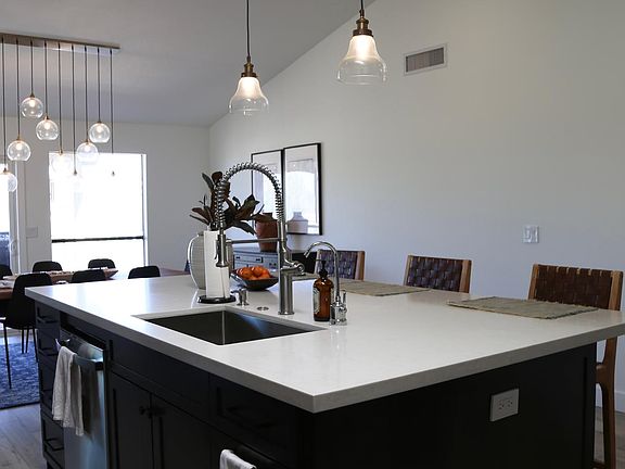 8ft x 5ft island with kitchen sink, dishwasher, and pull out trash and recycle bin